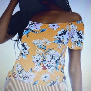 Super cute women’s off shoulder tankini top.